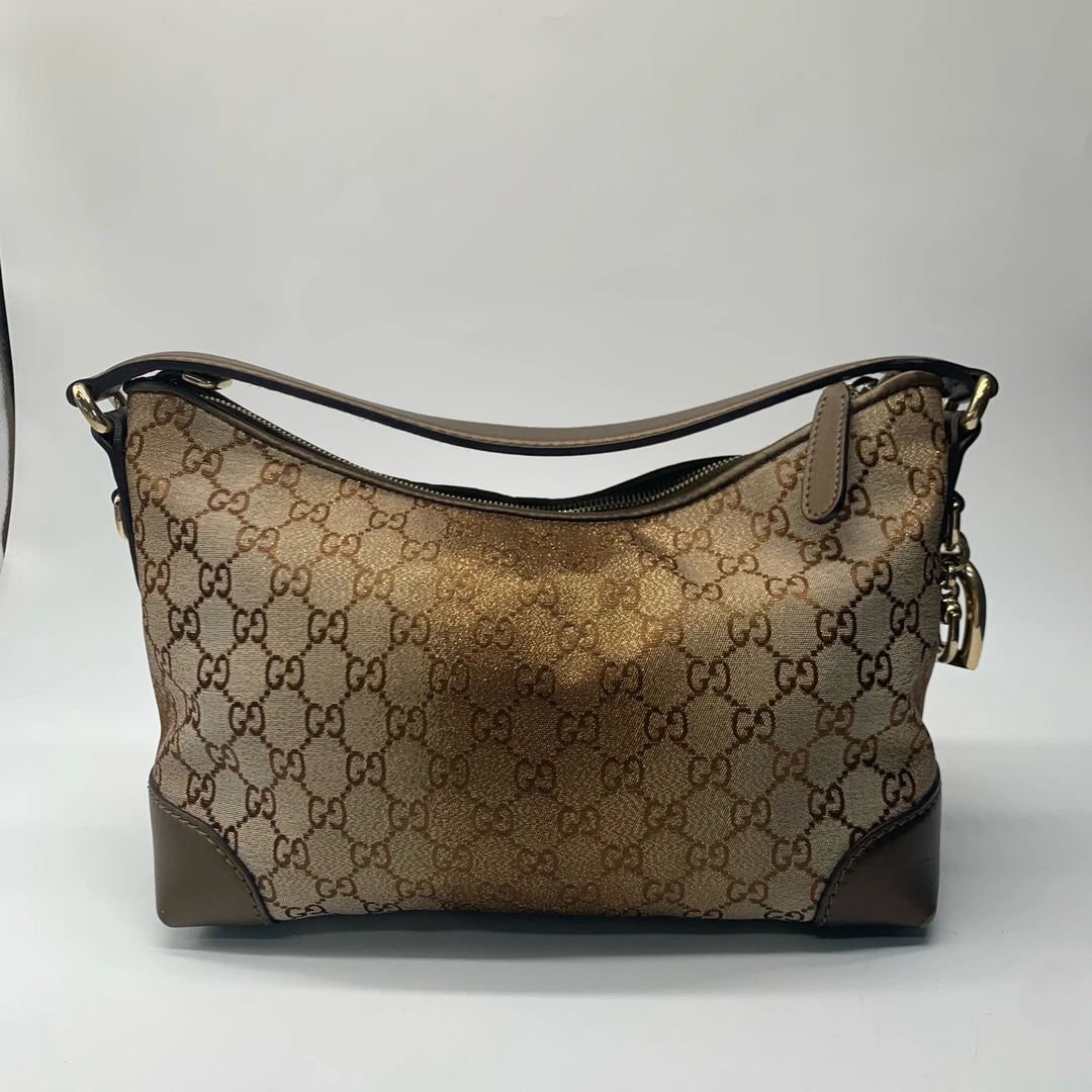 99新 GUCCI/古驰 单肩包 老花饺子包金色dx4638