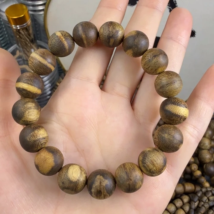 伊***空沉香沉香碎屑莺歌绿奇楠1.2虎斑圆珠9克