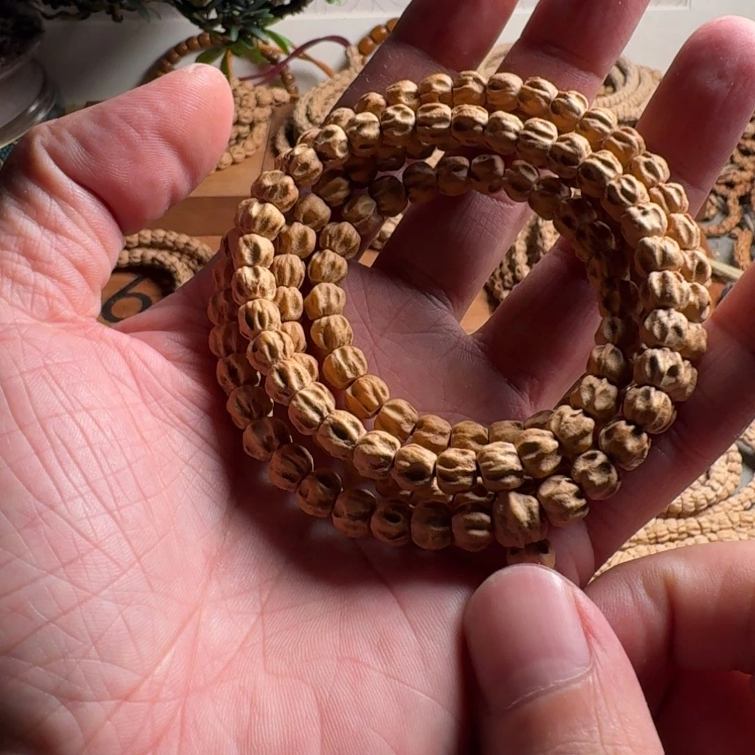 李***图柏香籽/百香籽吊坠7毫米