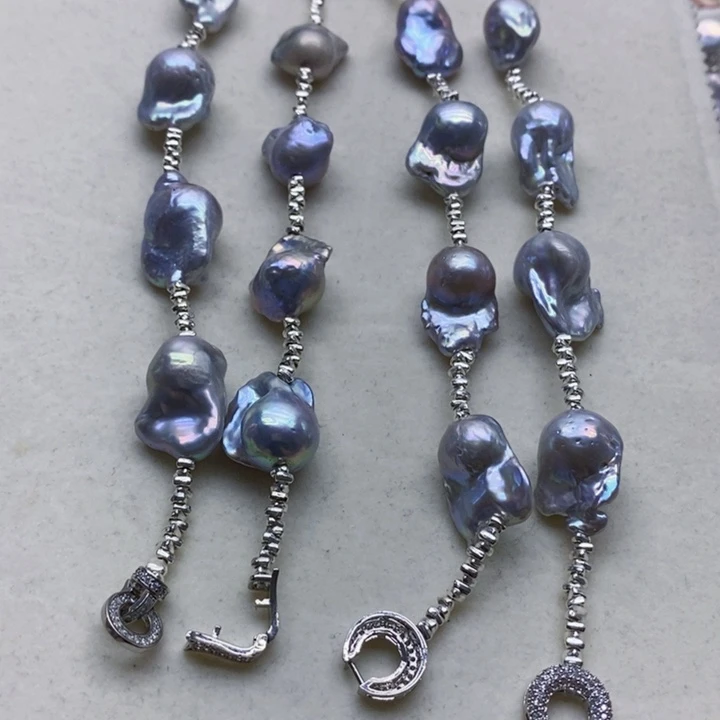 银S925镶嵌淡水珍珠耳饰乡*