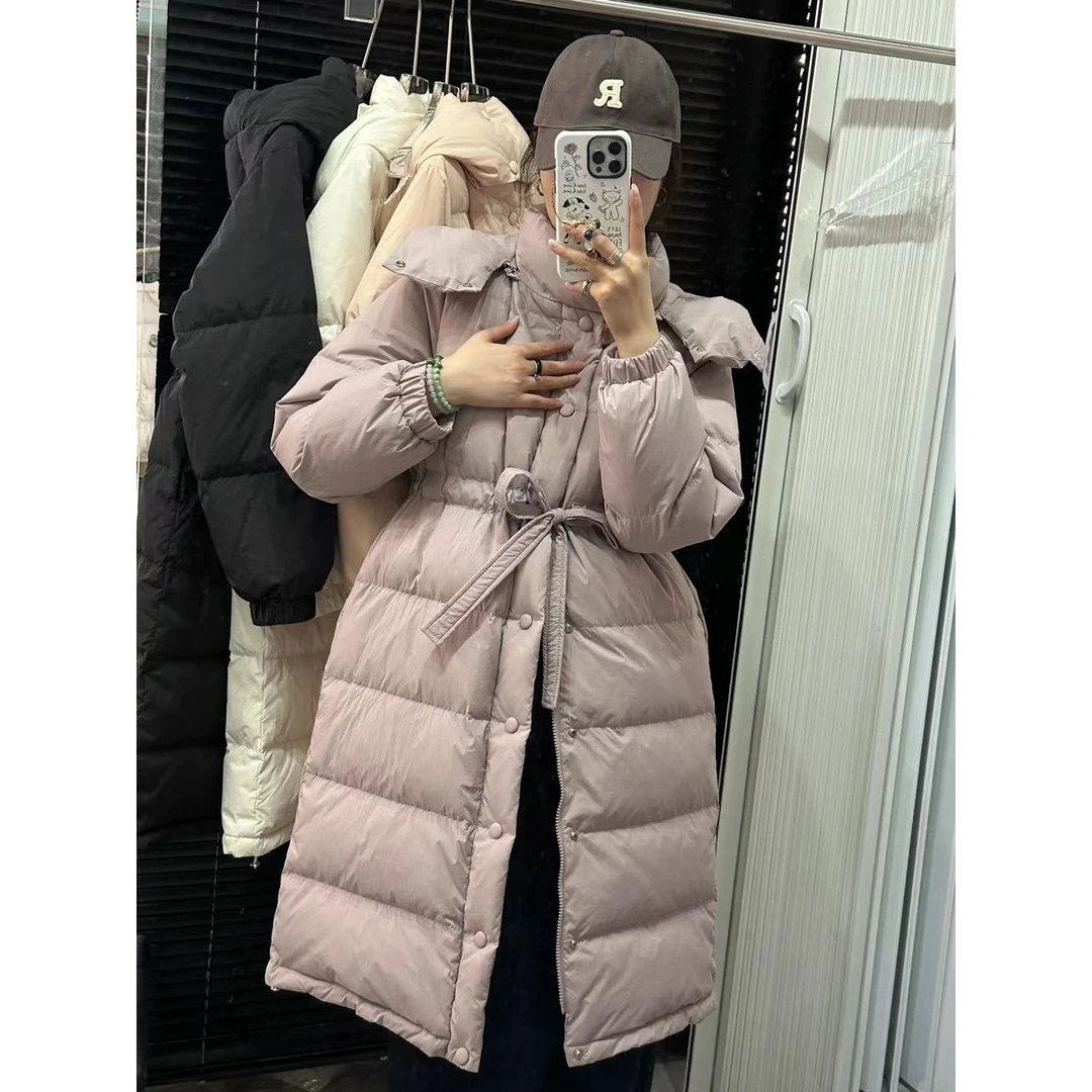 羽绒服女2025冬新款收腰长款连帽加厚白鸭绒保暖显瘦修身过膝外套