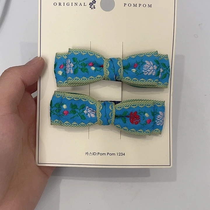 布艺铁合金蓝色蝴蝶结拜拜