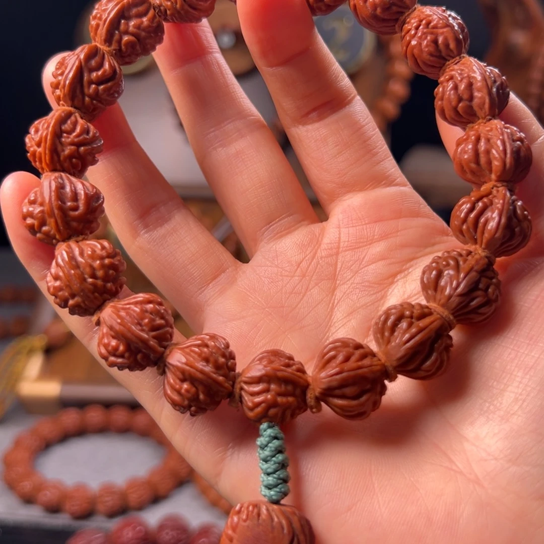 辉***歌桃核手串16野生红魔