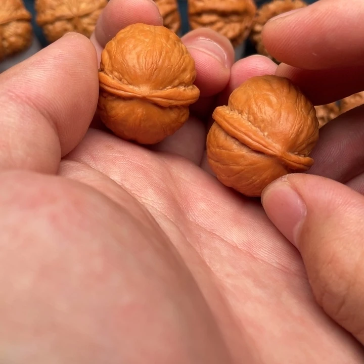 文玩核桃把件金佛