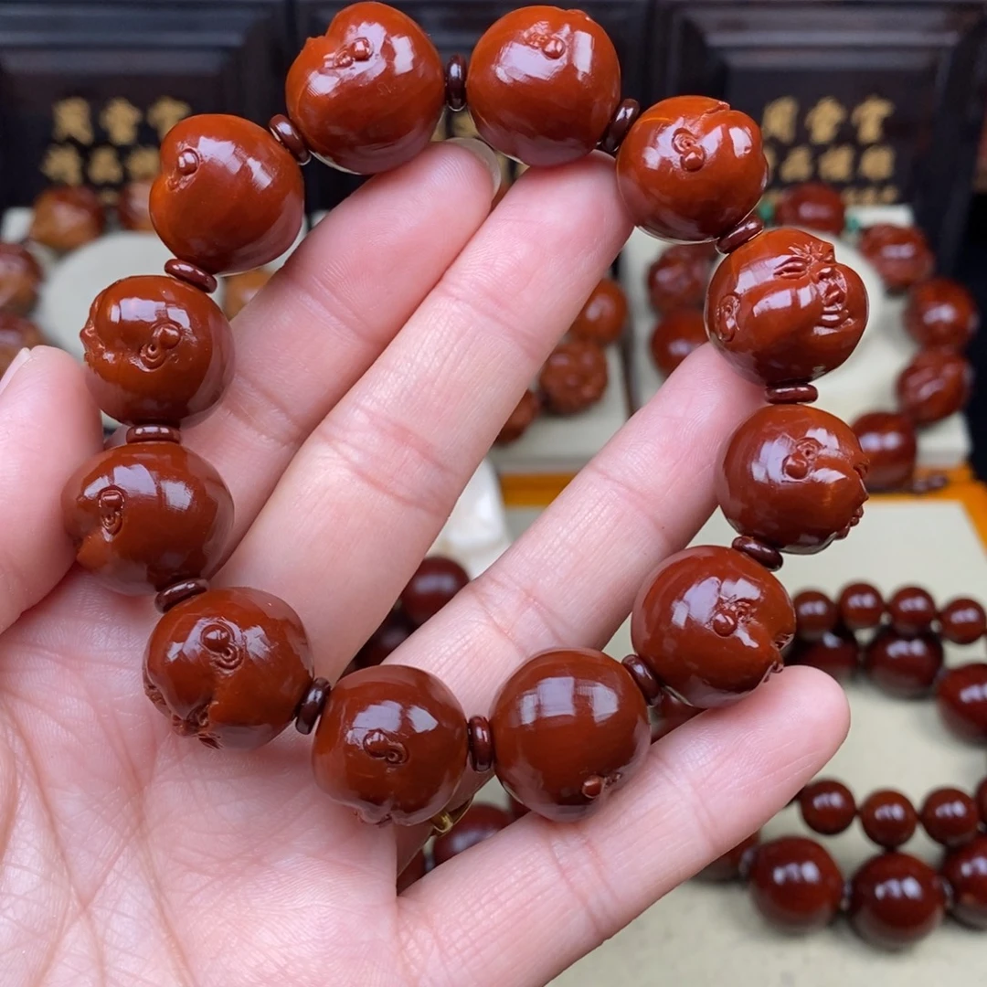 橄榄核吊坠人生百态