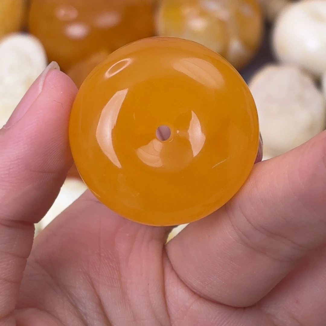 裸石琥珀未镶嵌橘红扣子