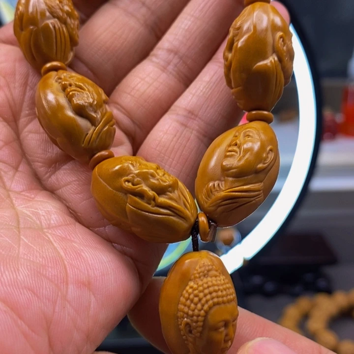 橄榄核吊坠哟哟哦杨杨杨杨杨杨我哦哦