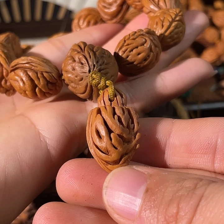 A***e吊坠桃核碧桃核肌肉纹手持