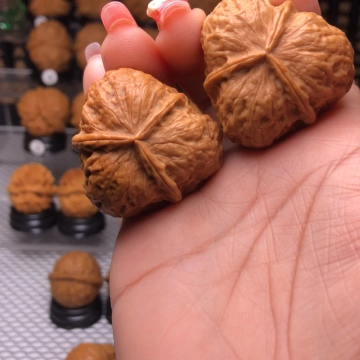 橄榄核把件暖****乡88花开富贵三楞