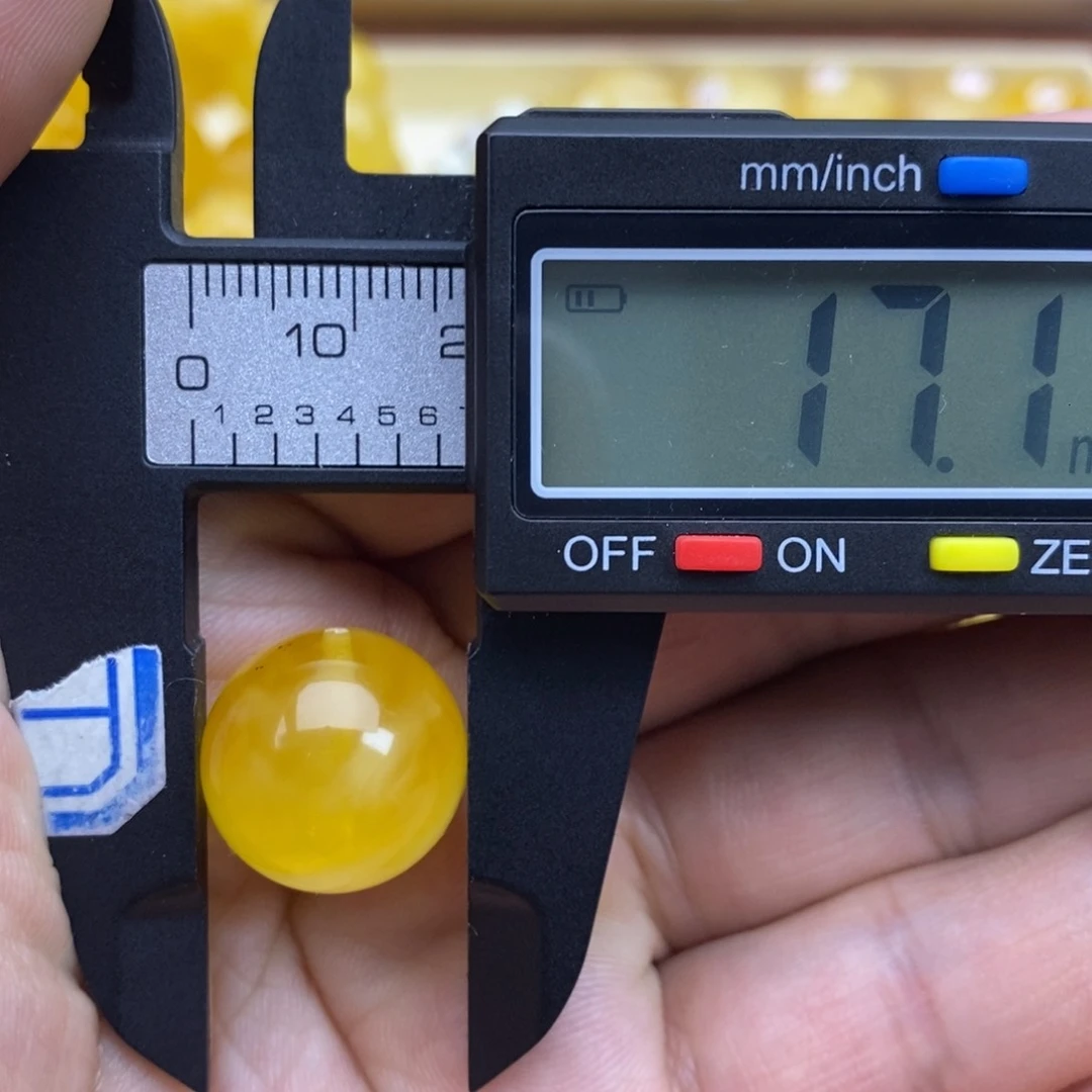 琥珀裸石未镶嵌乌**?17.1微瑕花粉圆珠
