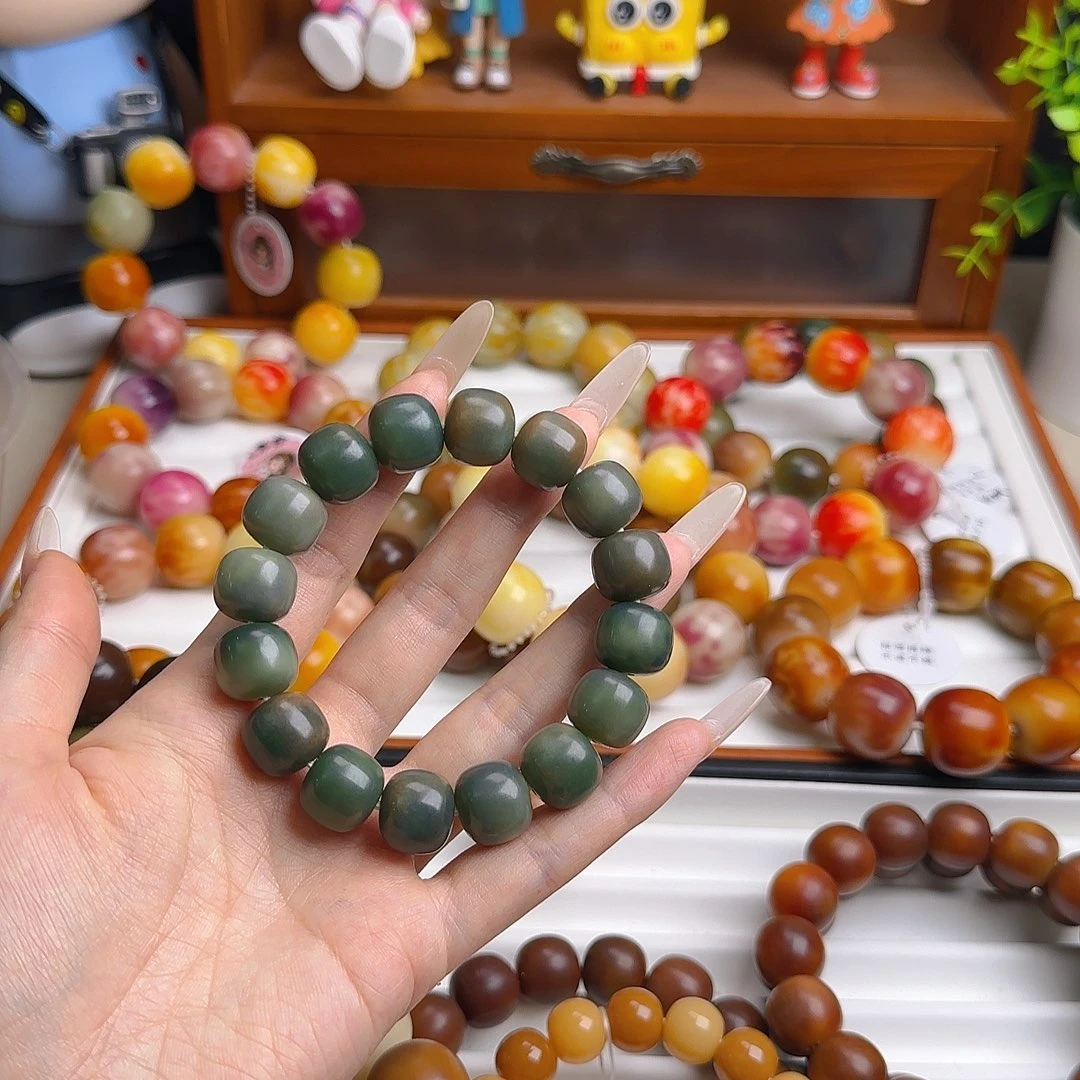 卡***莎吊坠菩提根/象牙果卡14桶珠