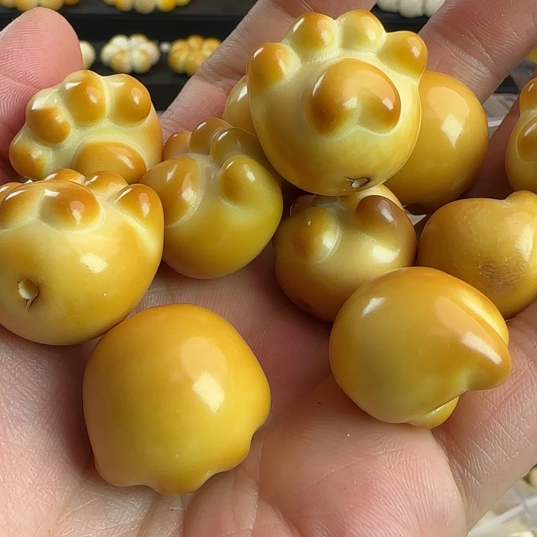 菩提根/象牙果吊坠微瑕疵炭烤爱心猫爪5颗（大小随机）