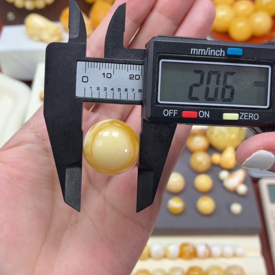 琥珀未镶嵌珠宝奇石俄料浓蜡眼睛溶洞圆珠20.7mm