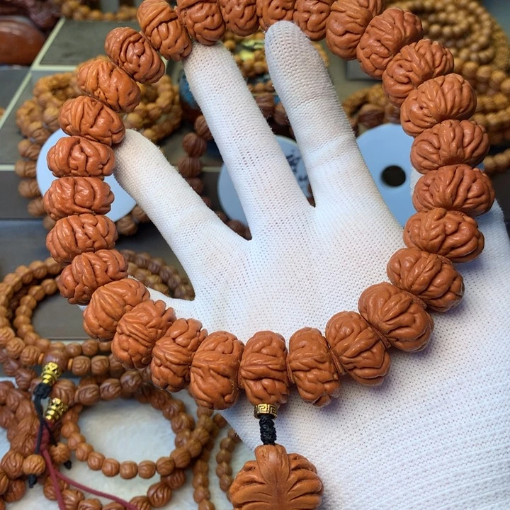 吴***明手串桃核秦岭龙纹