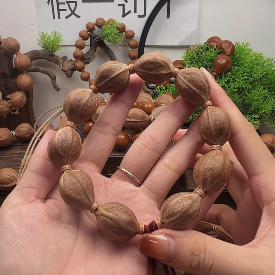 鱼***归橄榄核手串20.26梅林铁核