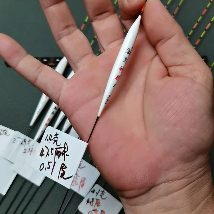 执***手孔雀羽带壳羽根一支1.4克A03
