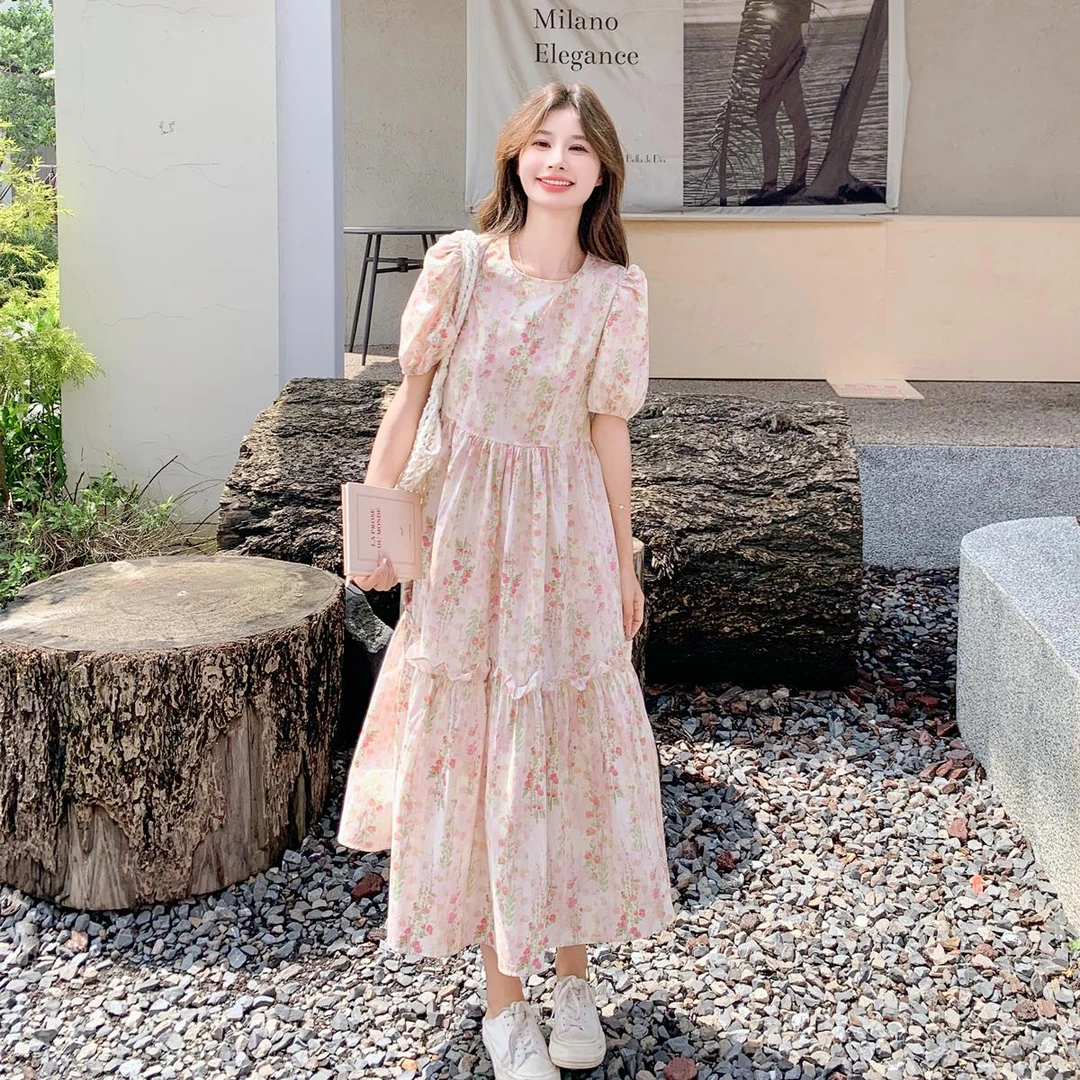 粉色印花连衣裙夏季女2024新款韩系泡泡袖木耳边宽松茶歇A字长裙