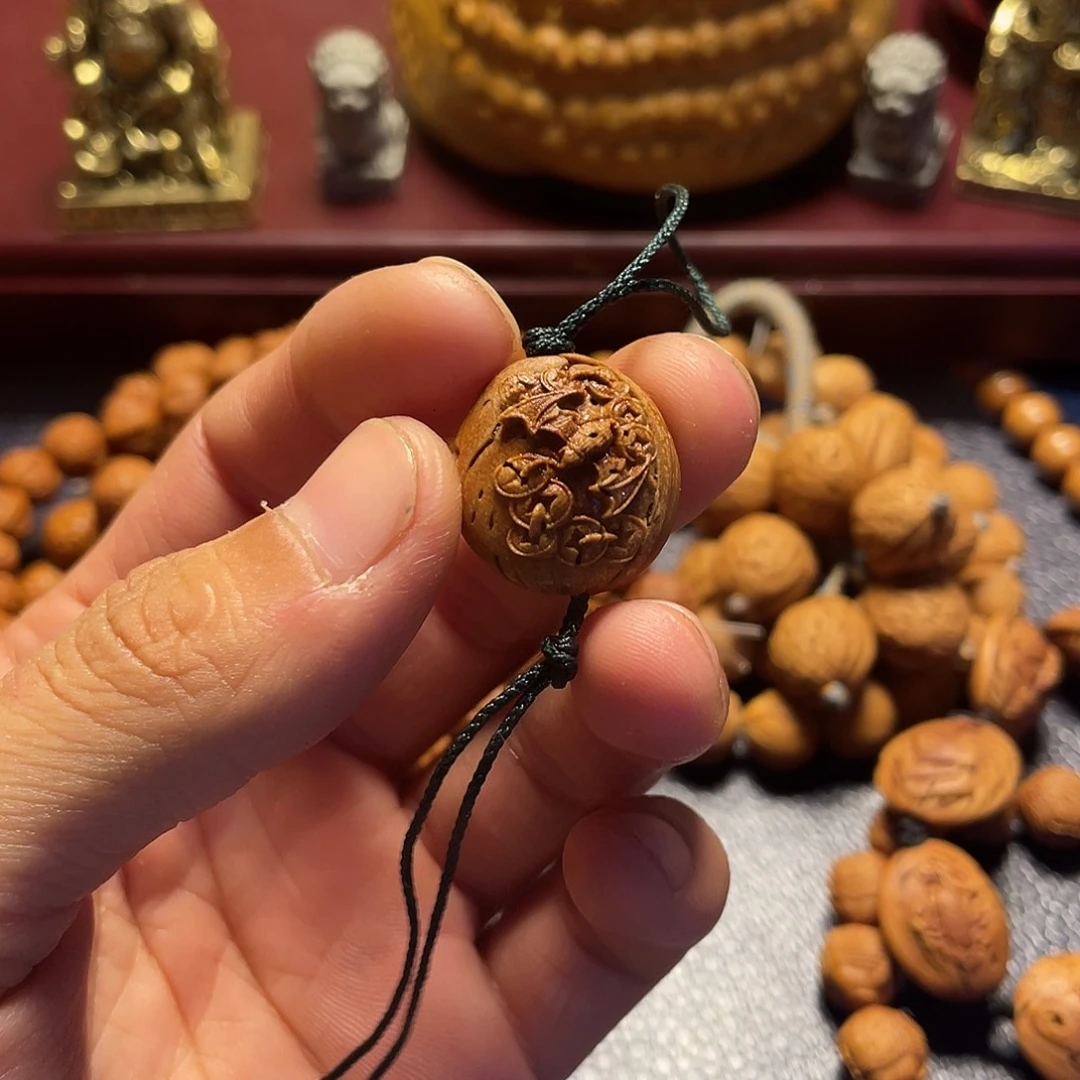 像***你大桃核雕刻蝙蝠单籽