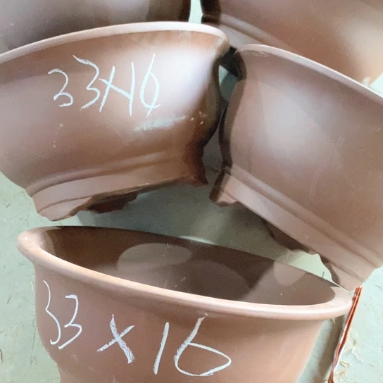 紫砂花盆100-5。        33-16