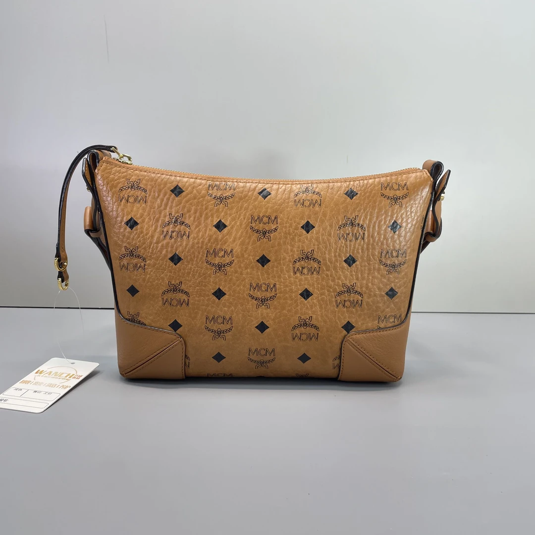 95新 MCM 媚姐/mcm干邑色牛角单肩斜挎包26x18x6cmG040210