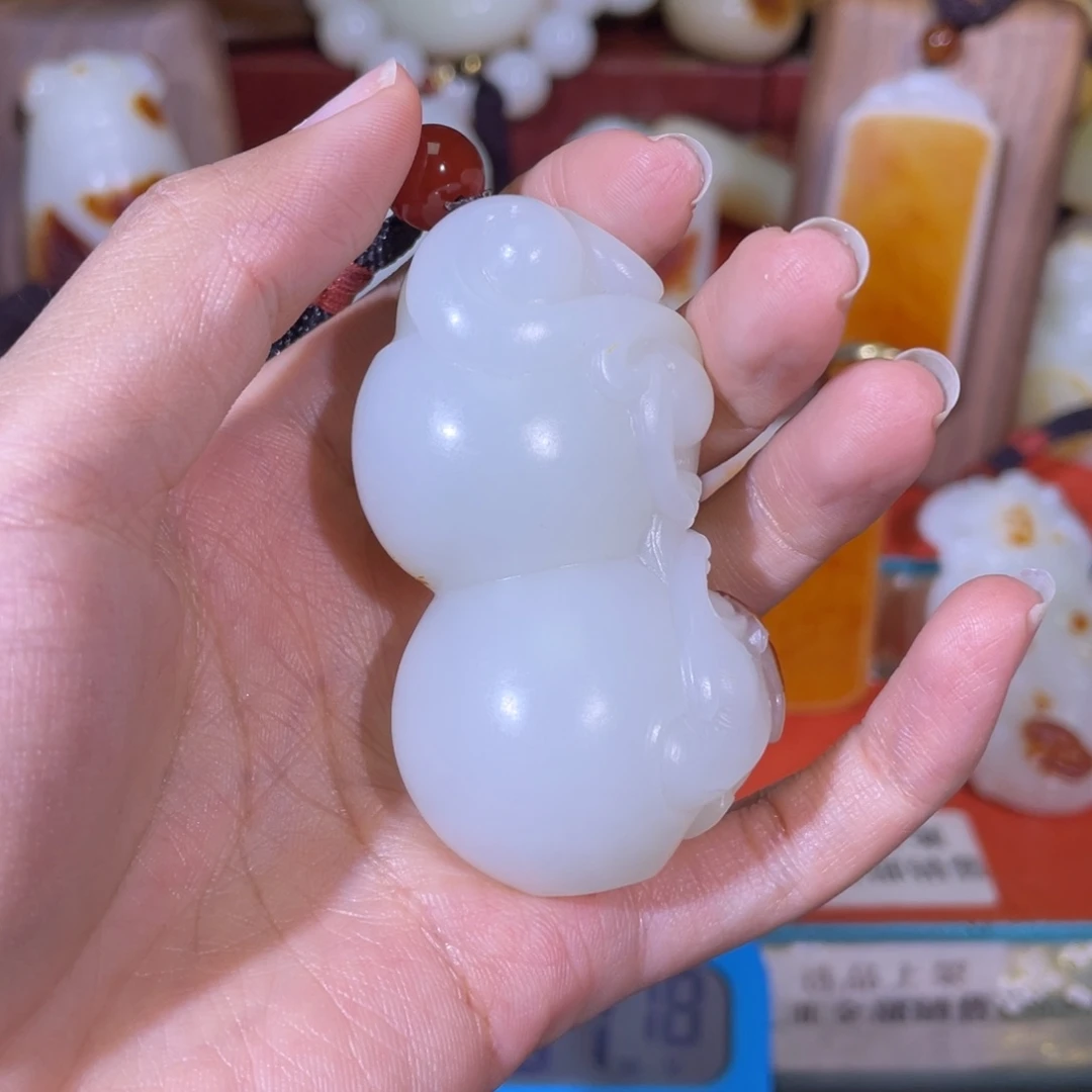 谦***。和田玉未镶嵌挂件