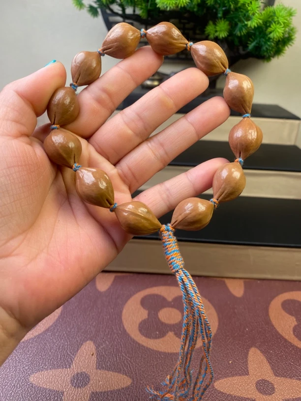 橄榄核1.6原皮老树手持12颗