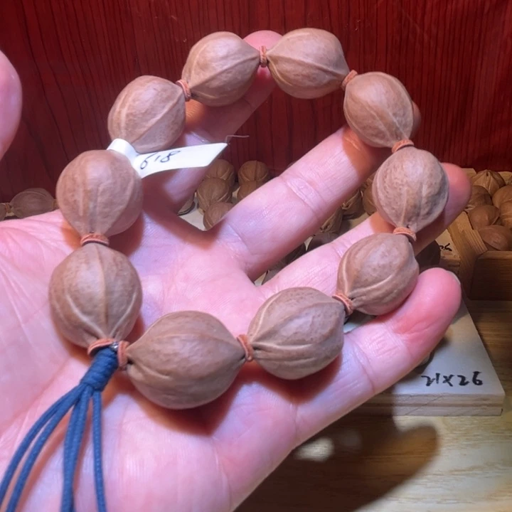 欢***贸橄榄核手串/手链1.9×2.6梅林铁核手串