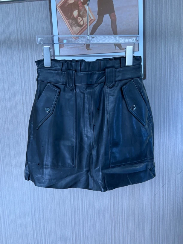 014品牌撤柜女装曼家时尚设计款皮裙短裙