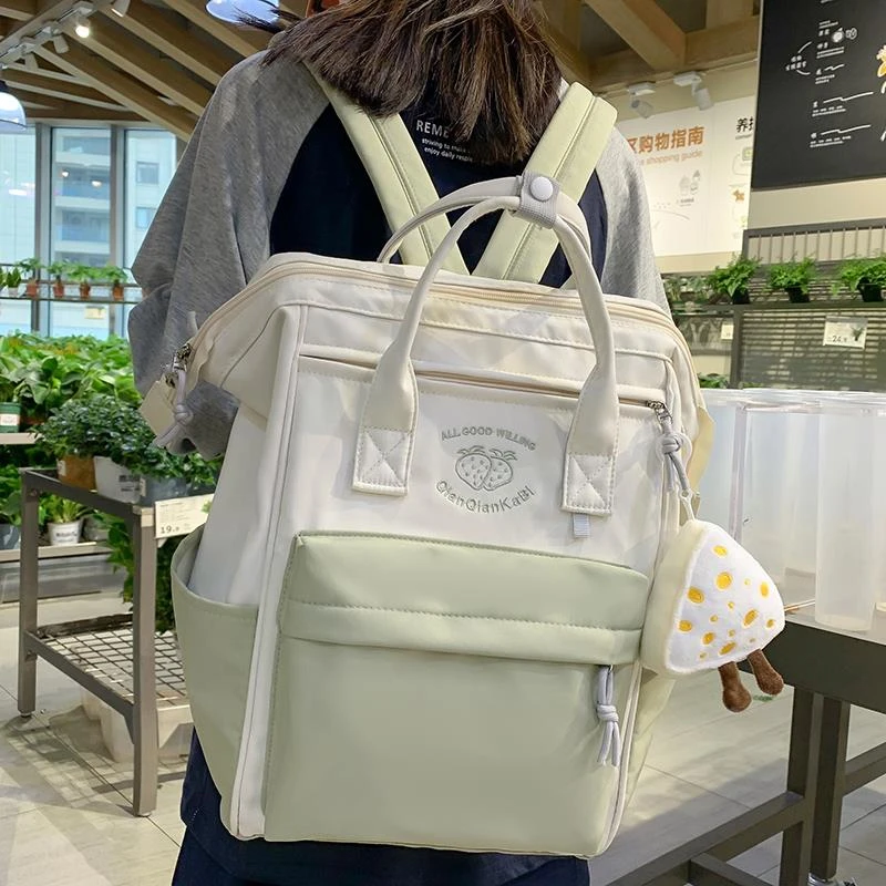德国手提书包女生2025新款小学生初中生拼色背包高中儿童