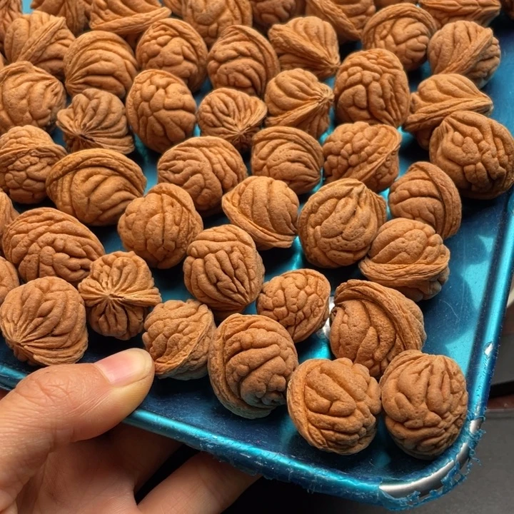 一***光桃核吊坠霸王龙残次半斤