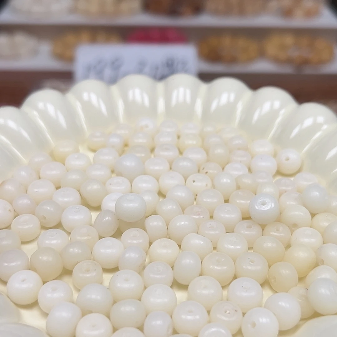 菩提根/象牙果手串微瑕卡10左右白色混200颗