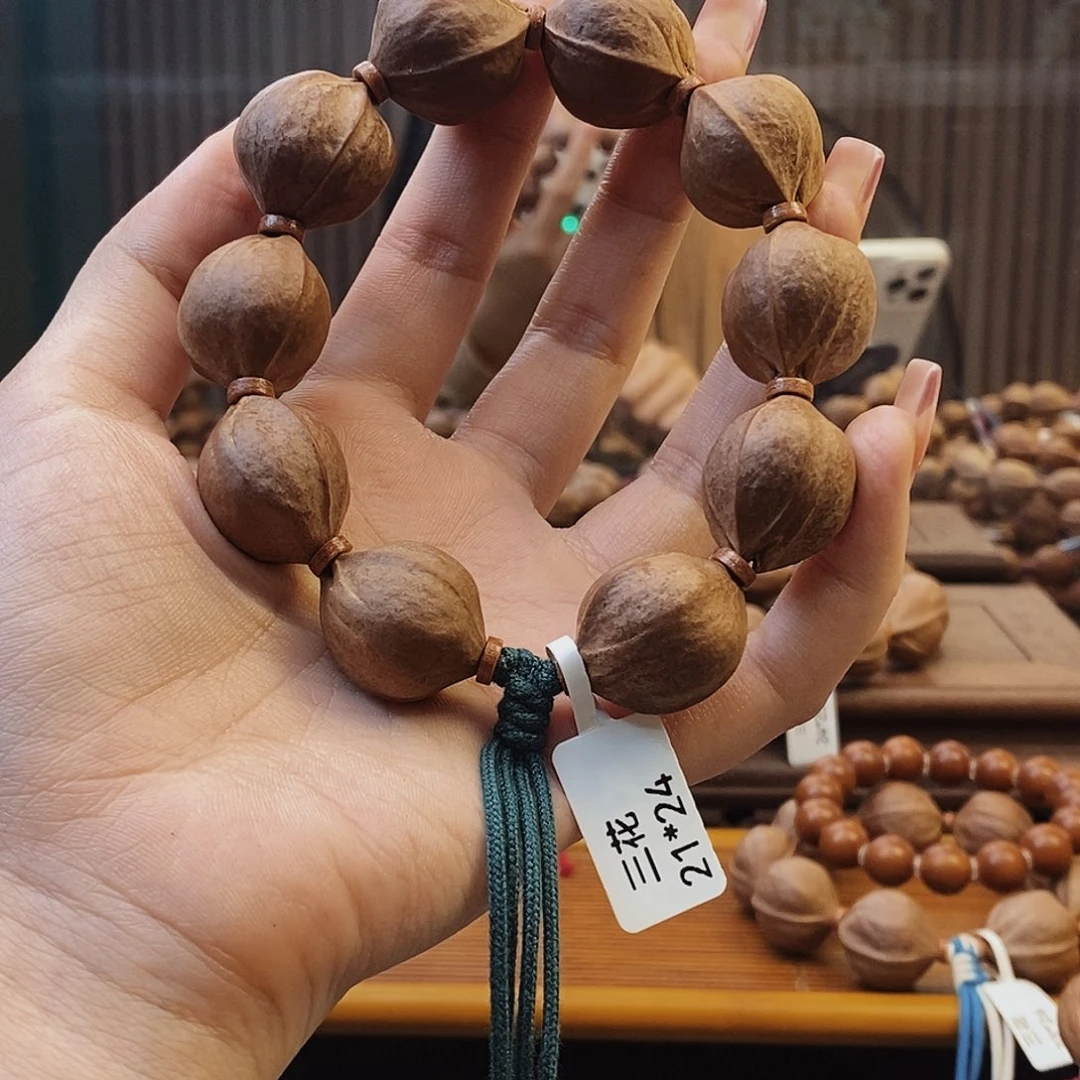 手串橄榄核哈*哦原生态正宗梅林铁核