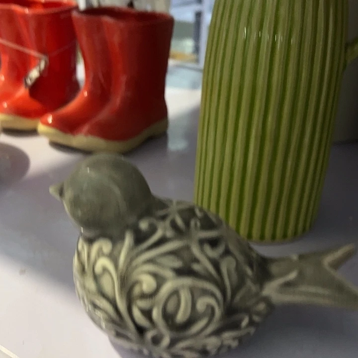 沐***陶瓷立体浮雕小鸟摆件