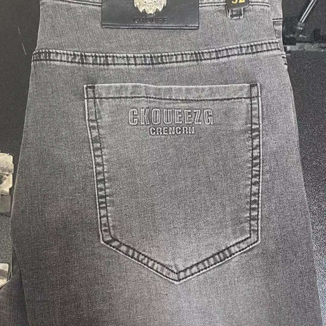 男装尾货春夏新款青年商务休闲简约百搭修身牛仔长裤8630