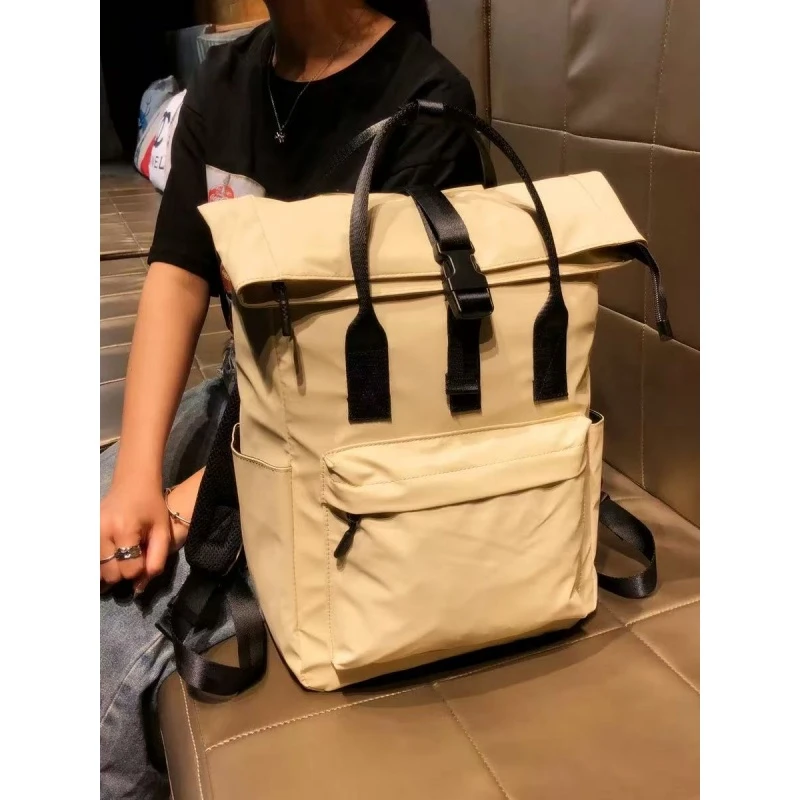 7053米黄2025新款时尚休闲双肩包百搭潮流透气简约双肩冲锋背包