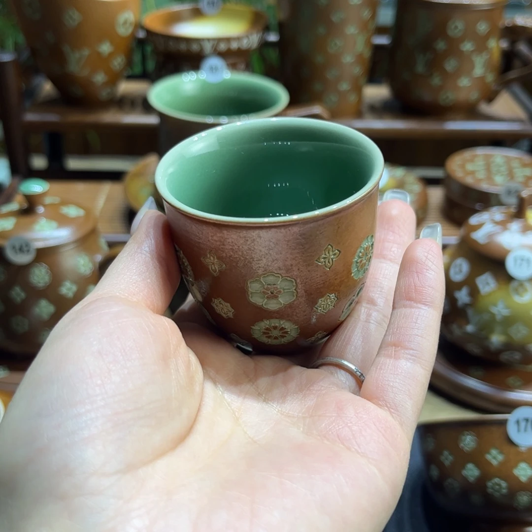 紫****草木灰宝相花壶填釉