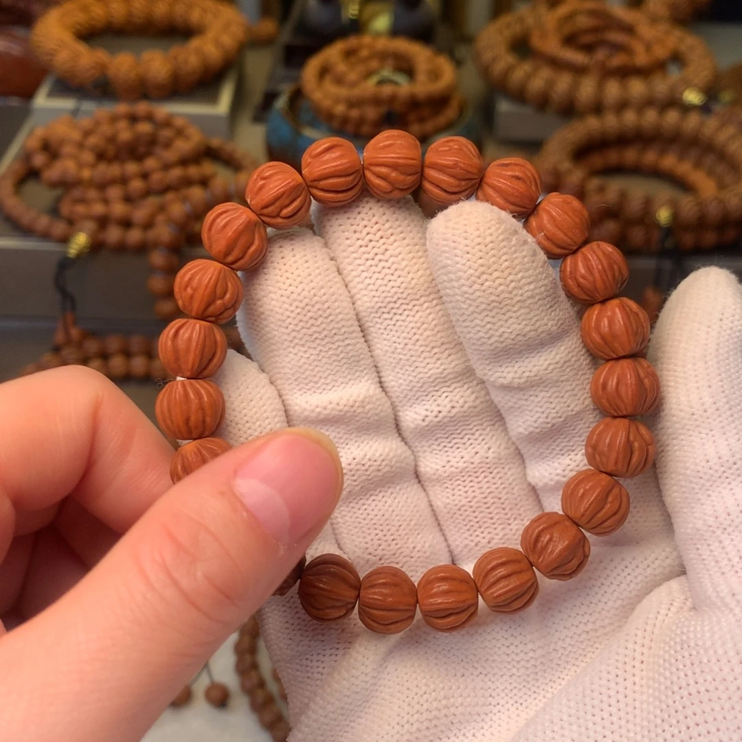 舍***开桃核手串秦岭龙纹