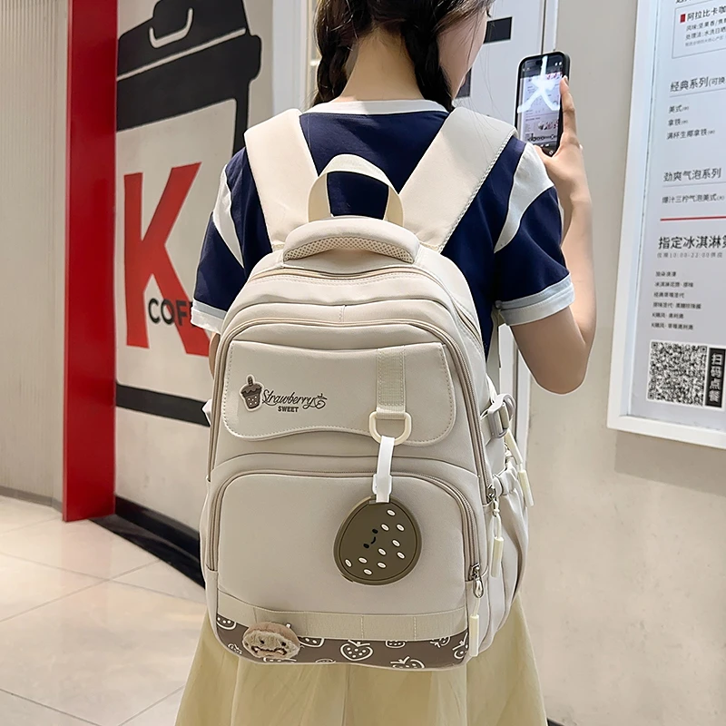 新款书包小学生大容量男女初高时尚中生百搭简约韩版校园双肩背包