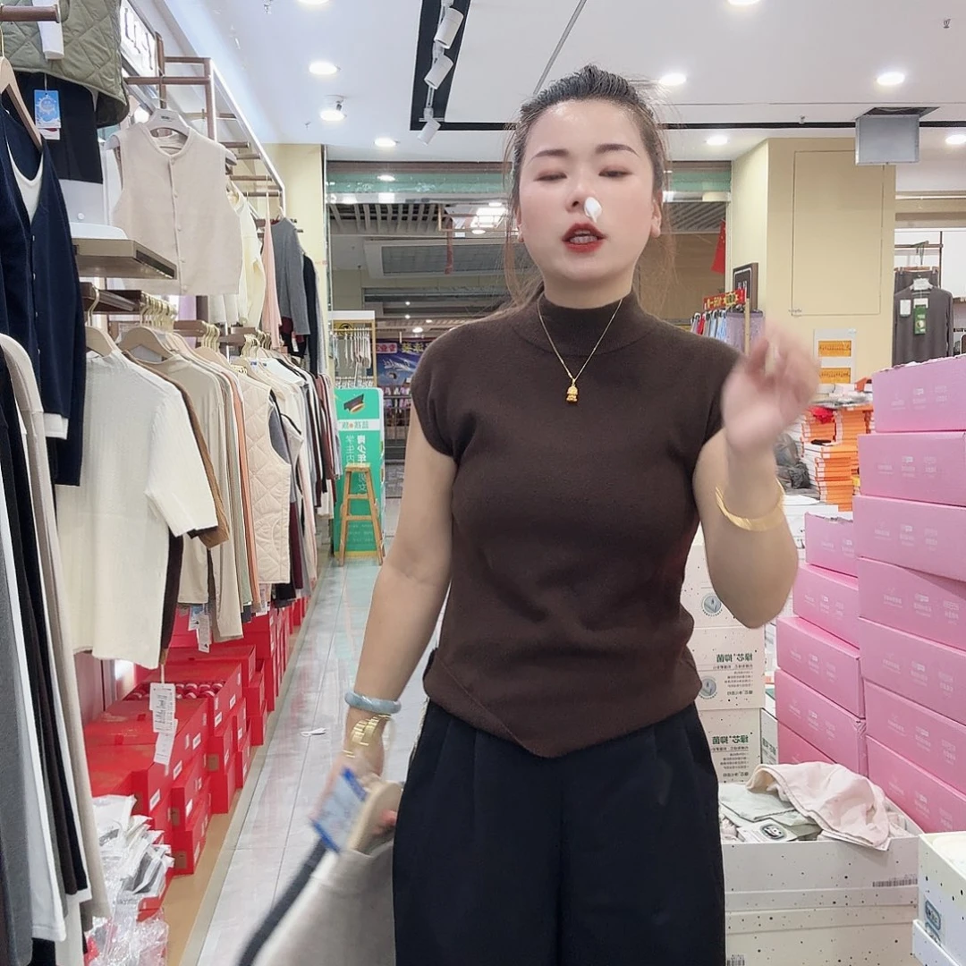棉A104咖色毛衫一件