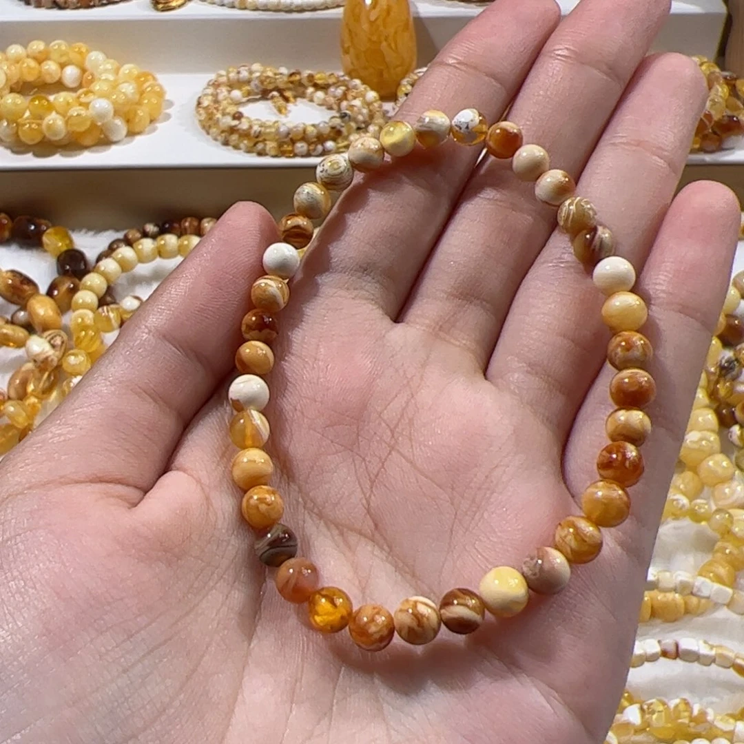 琥珀未镶嵌珠宝奇石橘沁妖花圆珠手串