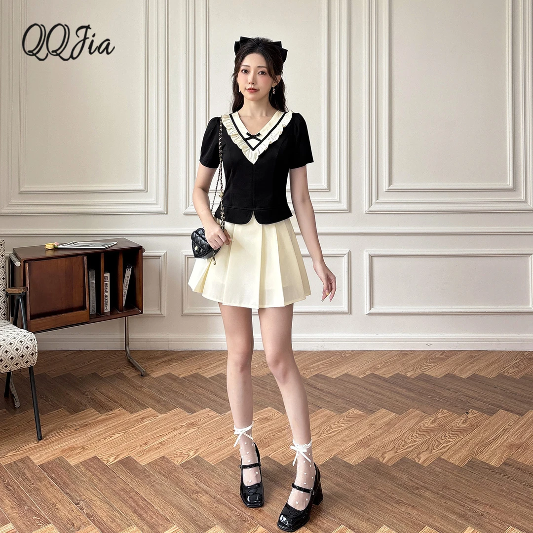 1066丘丘喆法式减龄套装女夏季高级感黑色V领短款上衣拼接两件套