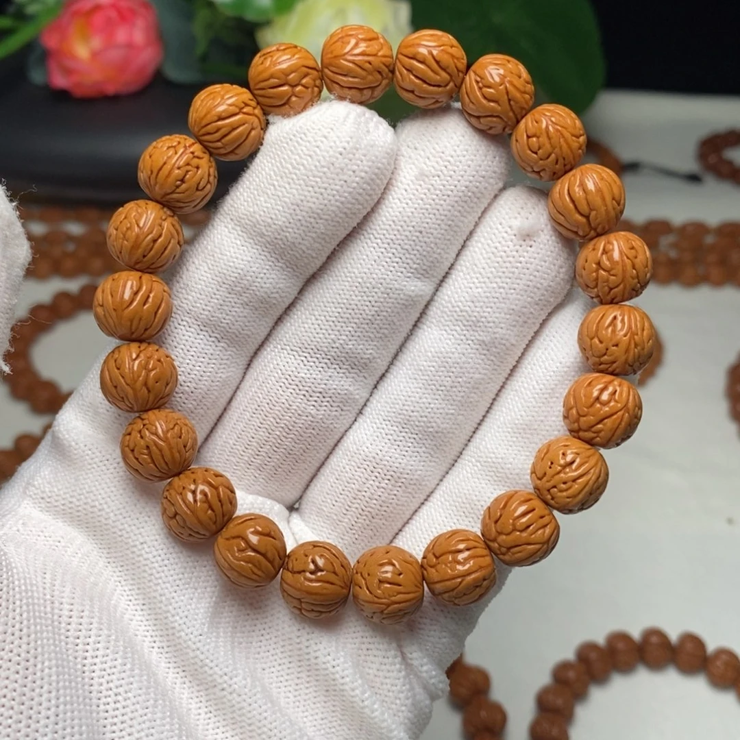 桃核手串11mm野生金麒麟桃核手串