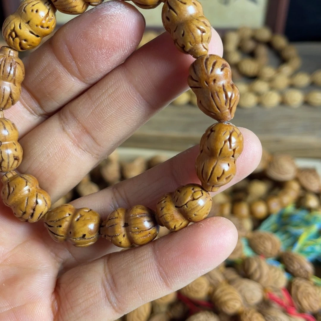 桃核手串L****nui io