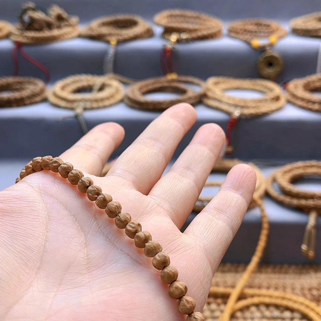 柏香籽/百香籽吊坠莉**.