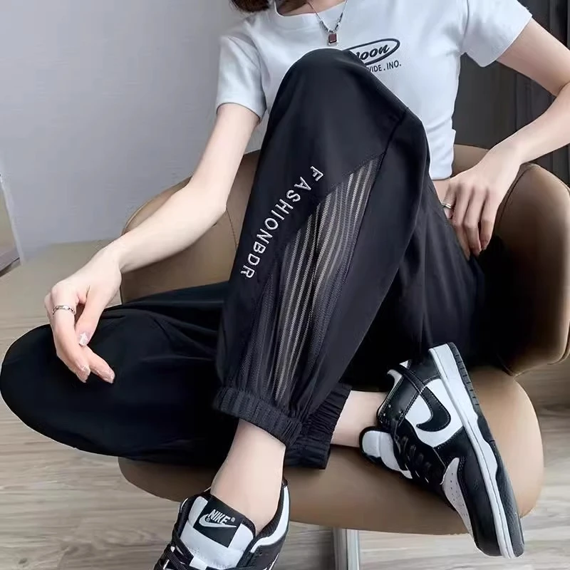 黑色高级冰丝速干运动裤女夏季薄款防晒网纱空调裤白色九分束脚裤