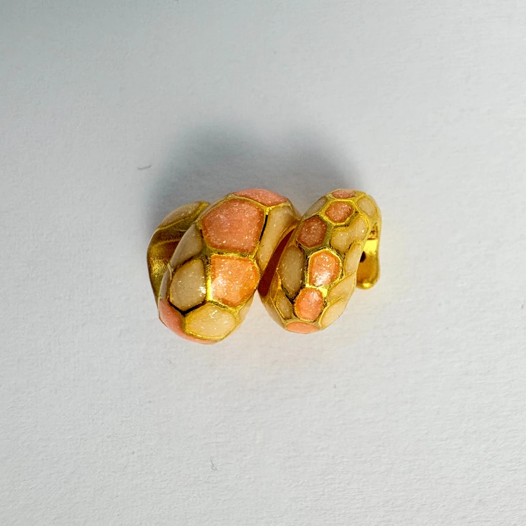 君潮黄金足金999粉白卷卷蛇DP1183