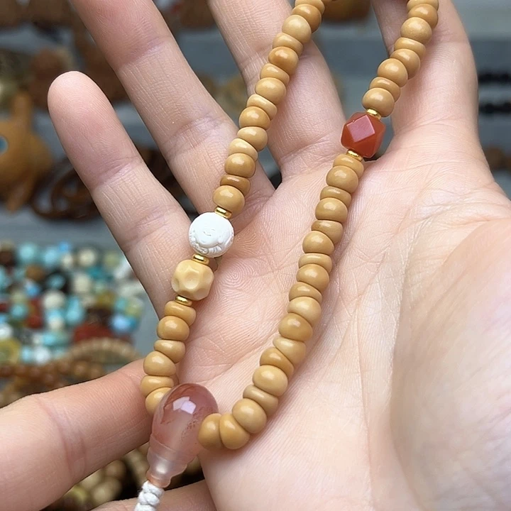 菩提根/象牙果吊坠6.7m m龙脊老料大肠手持