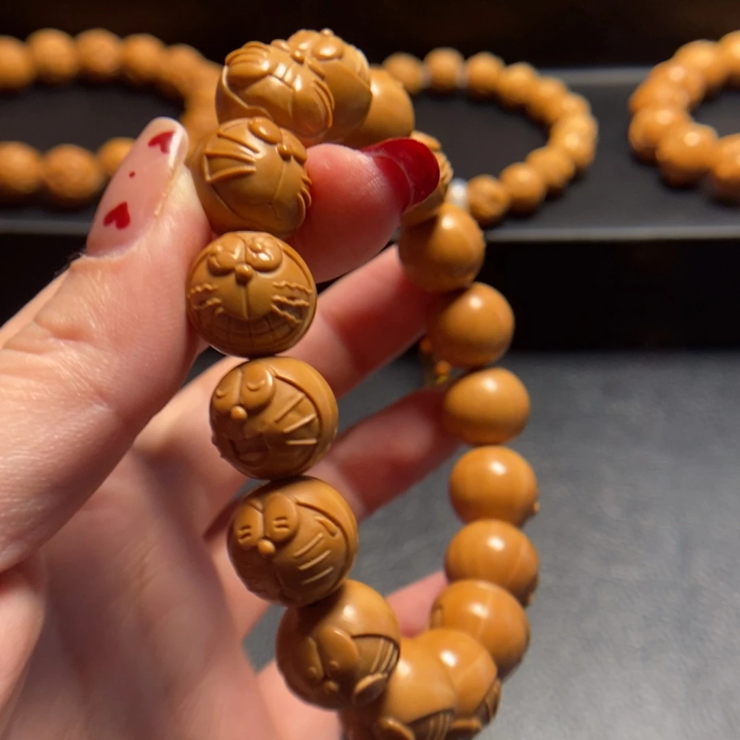 猴头核桃手串凹**?机器猫