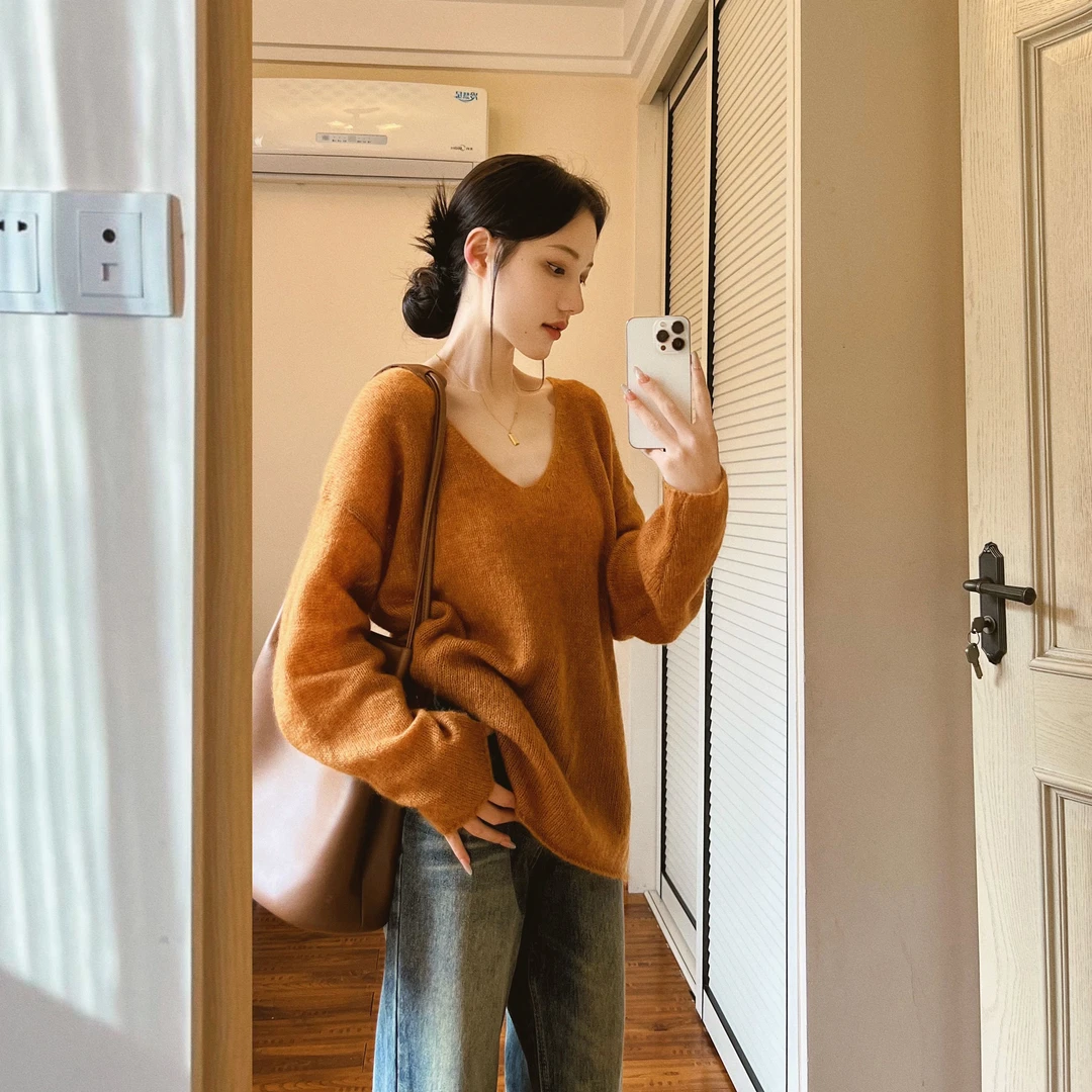 橘色v领长袖针织衫女春秋2025高级慵懒风软糯毛衣内搭打底衫上衣
