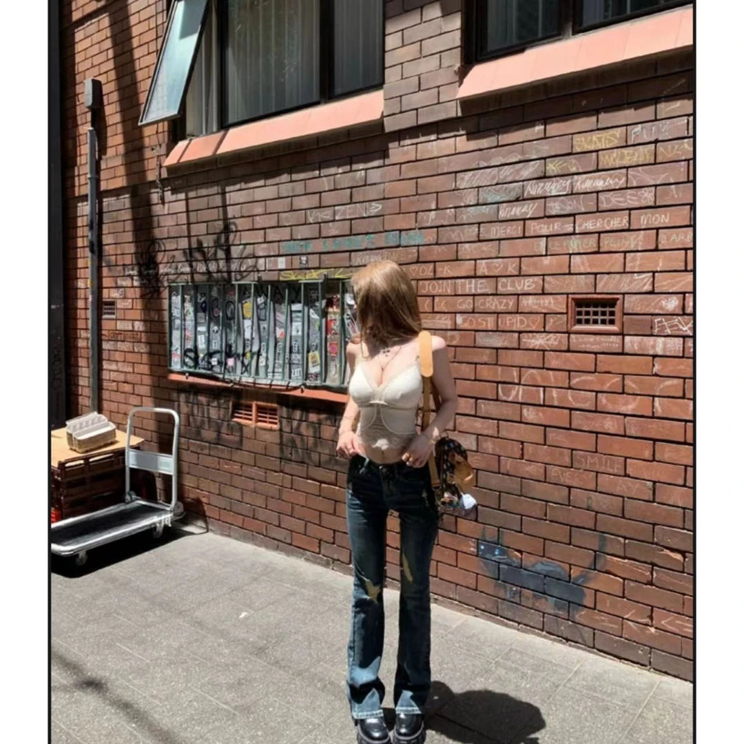 曼曼【腿精养成系】 烫金泼墨低腰微喇裤显瘦弹力破洞修身牛仔裤女